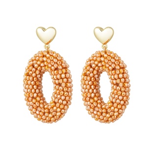 Boucles d'oreilles ovales avec perles et détail coeur