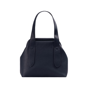 PU leather bag with fabric covered closure