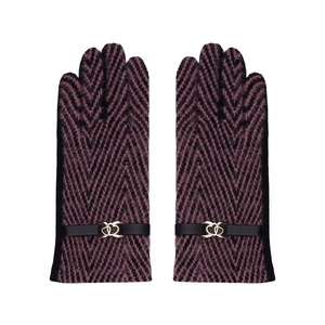 Gloves with buckle and charm