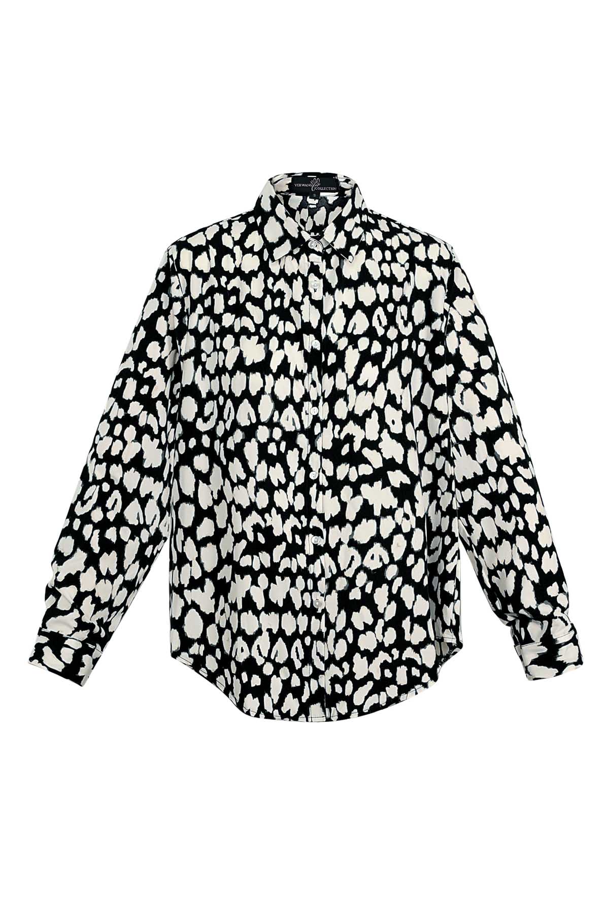 Blusa leopardata in bianco e nero 