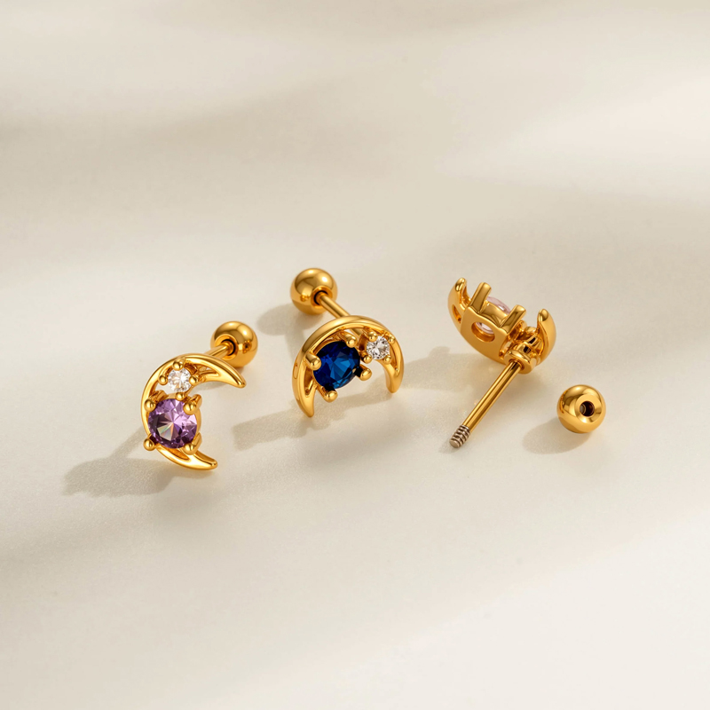 1 pendiente de perforación con circonita color luna, cobre y oro. Imagen3