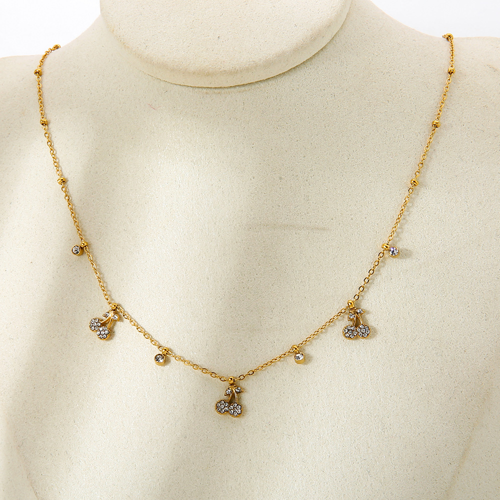 1 collar elegante y lujoso de acero inoxidable con colgante de fruta para mujer. Imagen4