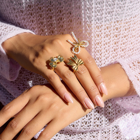 1 bague exquise en acier inoxydable couleur or avec nœud papillon