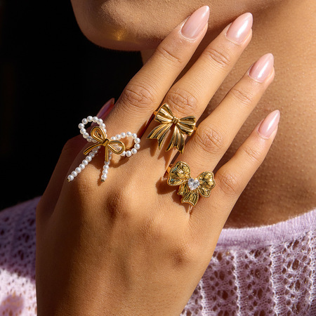 1 bague exquise en acier inoxydable couleur or avec nœud papillon 2